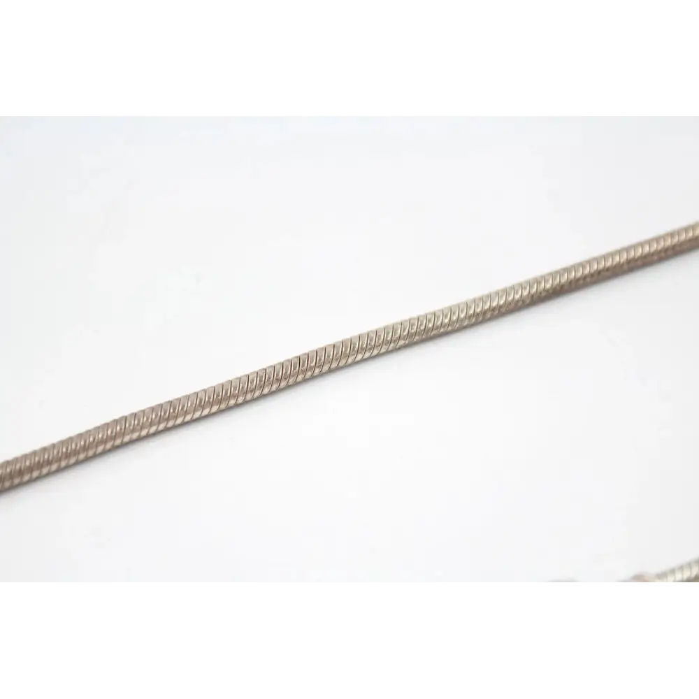 Metallic snake skin patterned cord