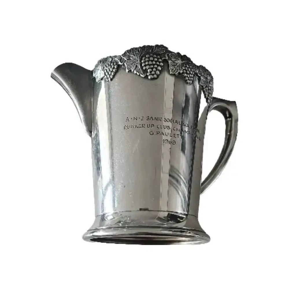 Silver pitcher with detailed design