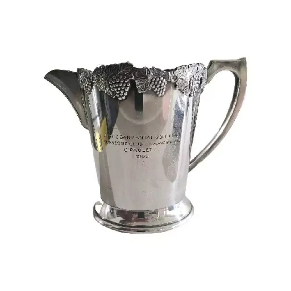 Silver pitcher with decorative handle