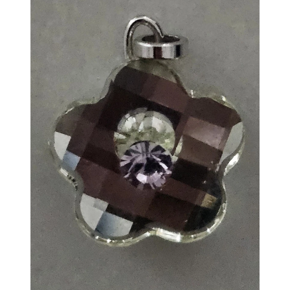 Crystal pendant with a central gemstone
