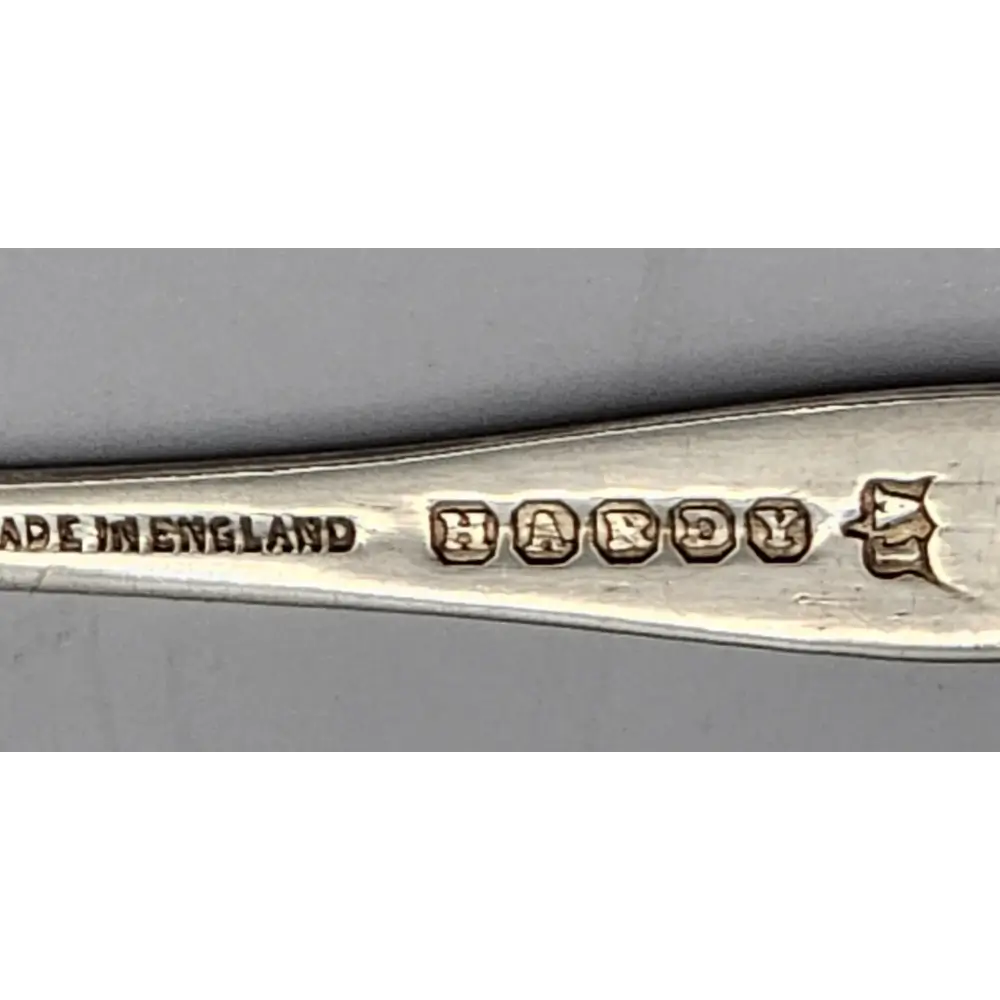 Silver spoon with 'Made in England' and 'Hardy' branding