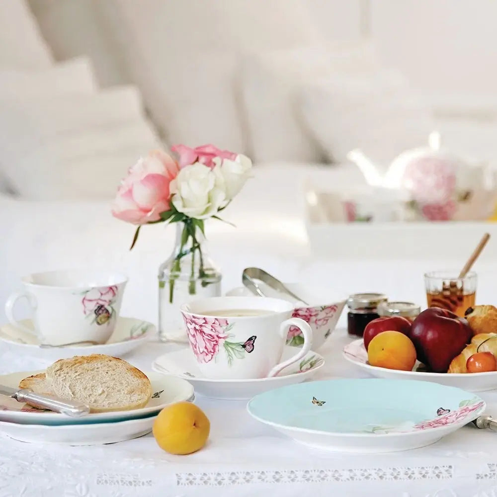 Tea set with floral patterns on a table