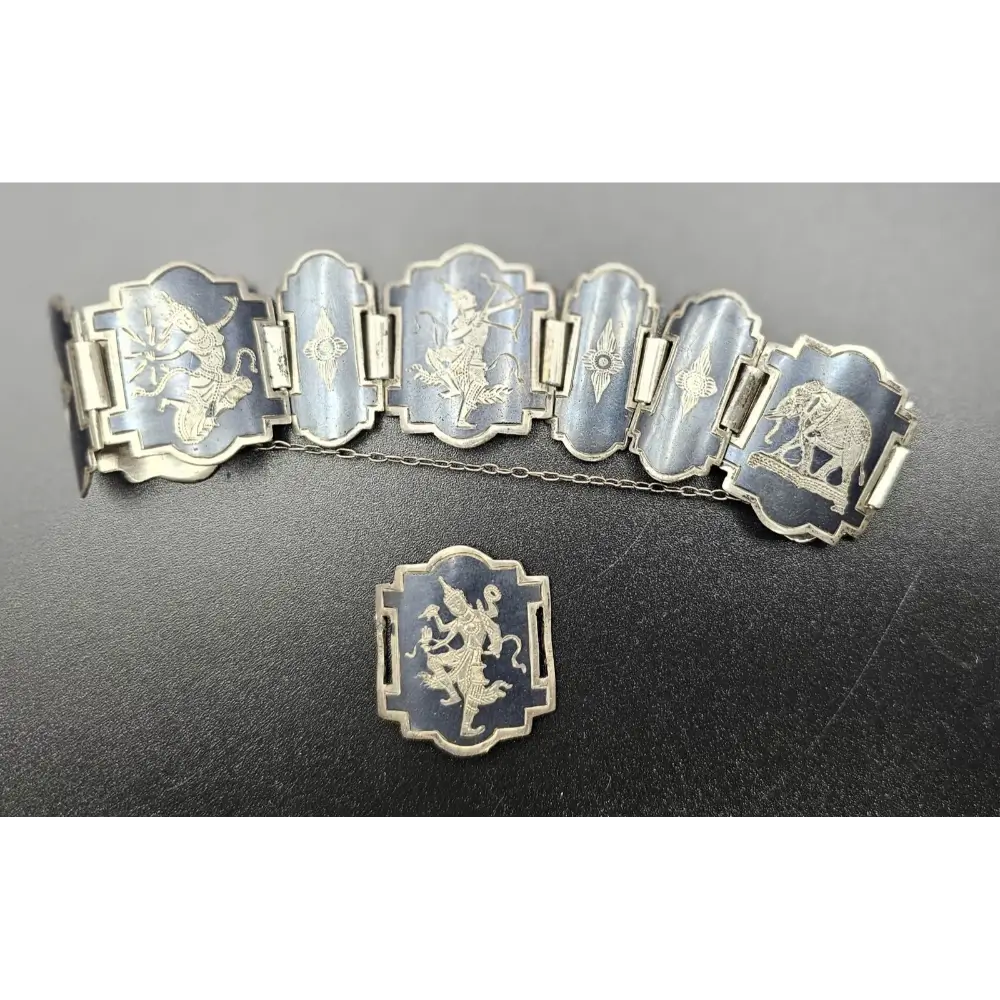 Decorative silver bracelet with intricate designs