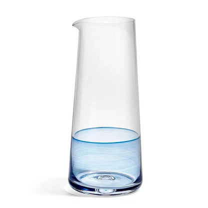 Clear glass carafe with blue accent