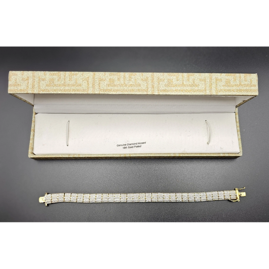 Diamond bracelet in front of an open jewelry box 