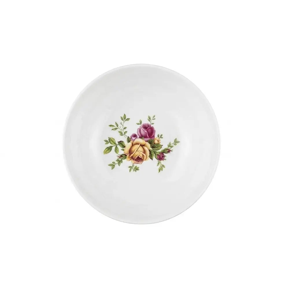 A white ceramic plate featuring a classic vintage floral design in the center with yellow, purple, and green roses and leaves, isolated on a white background.