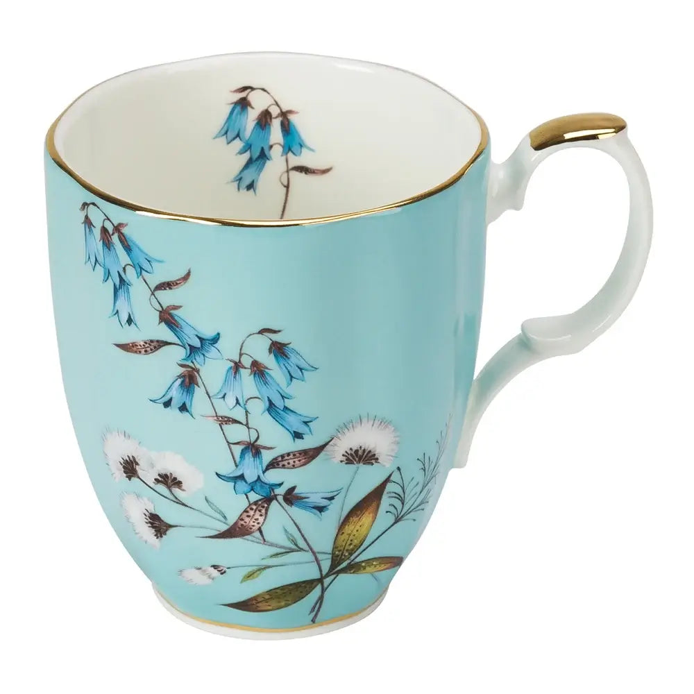 Teal mug with floral design