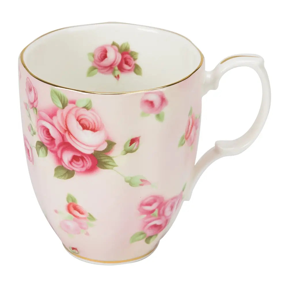 Pink floral mug with a white background
