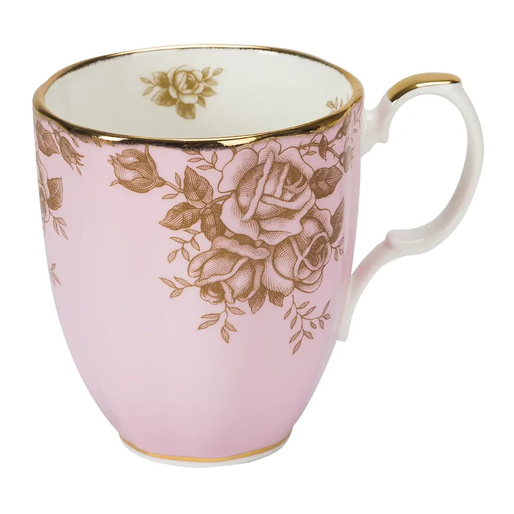 Pink mug with gold rose patterns