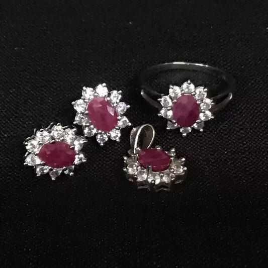 Jewelry set with ruby stones and silver accents