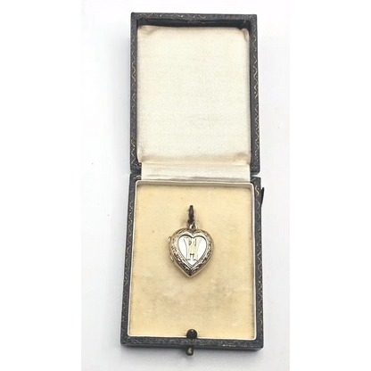 Silver heart-shaped pendant