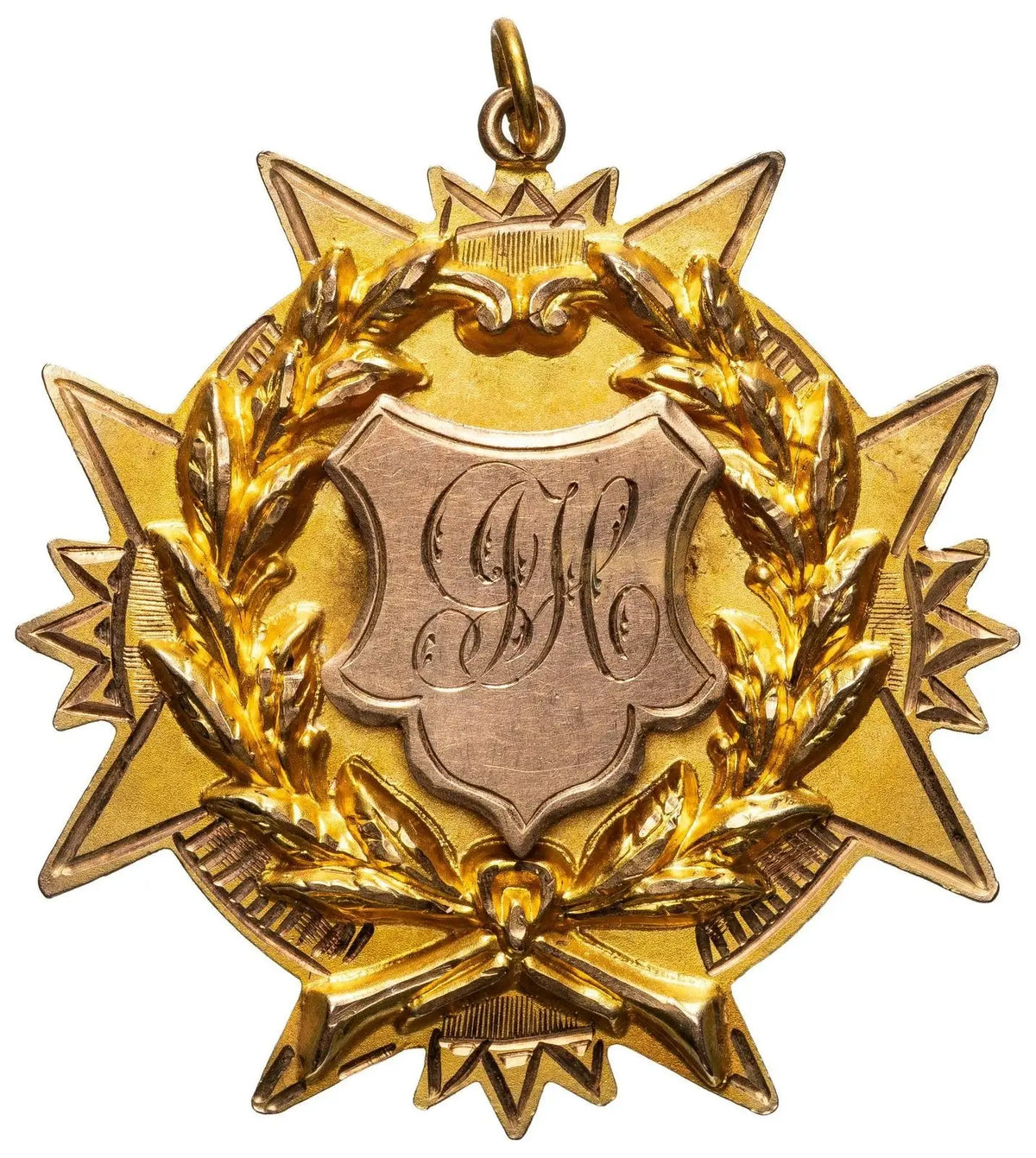 Antique 9ct gold star-shaped medal with laurel wreath and engraved J.J.H. monogram shield