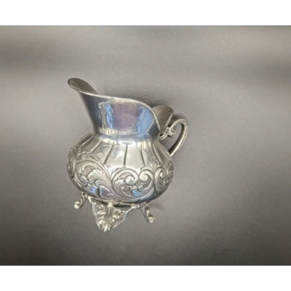 Decorative silver pitcher