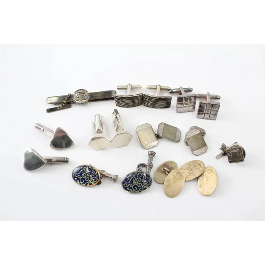 Collection of various silver and gold cufflinks 