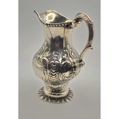 Decorative silver pitcher