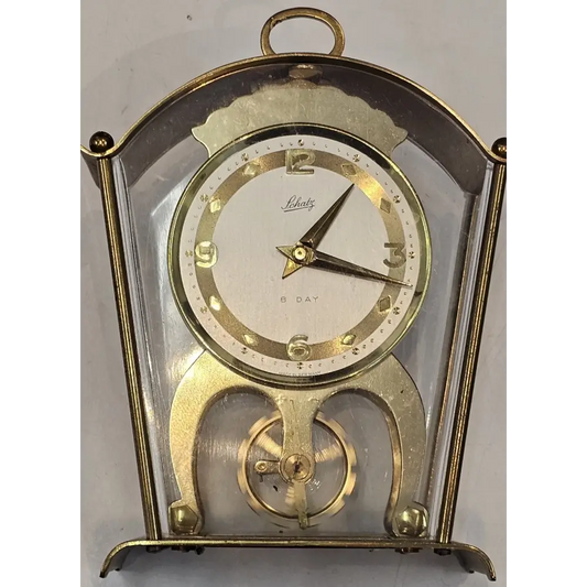 Vintage clock with gold and clear design