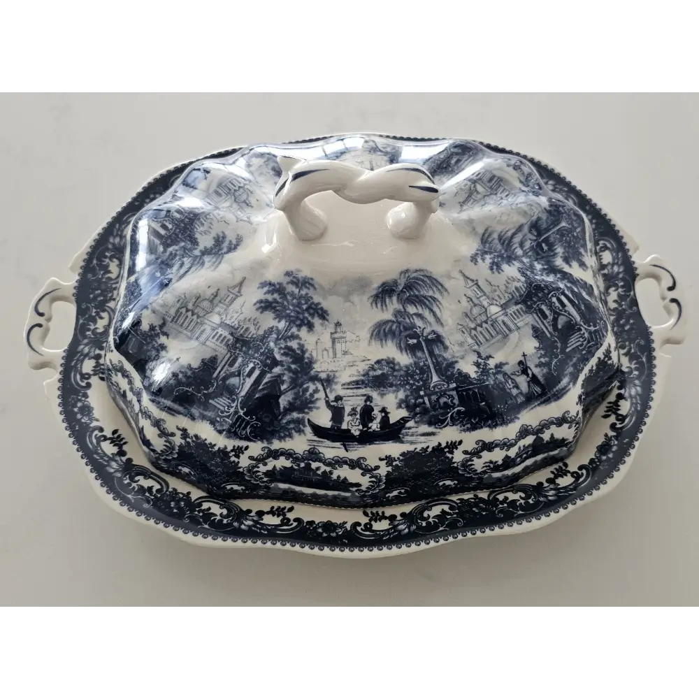 Antique Victoria Ironstone covered vegetable dish tureen featuring a detailed scenic transferware pattern.