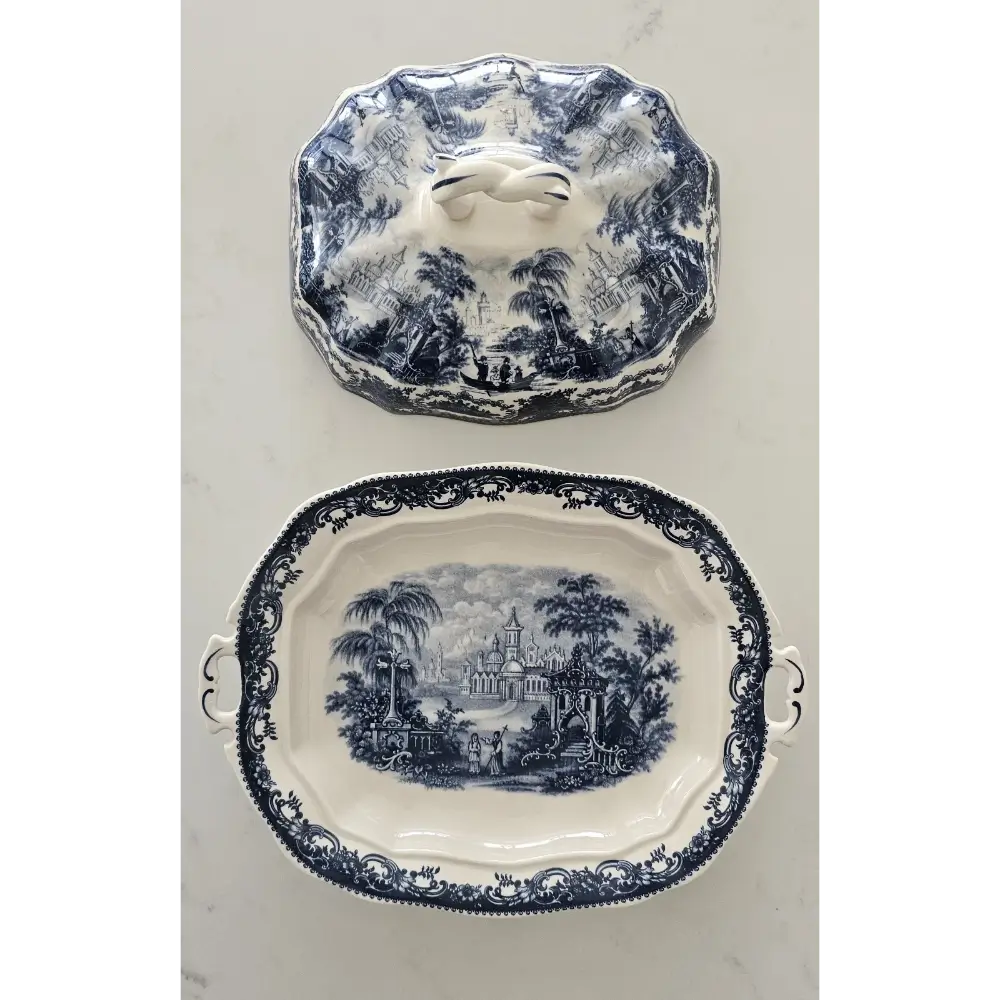 Top view of the matching Victoria Ironstone lid, highlighting the sculpted finial handle and decorative border.