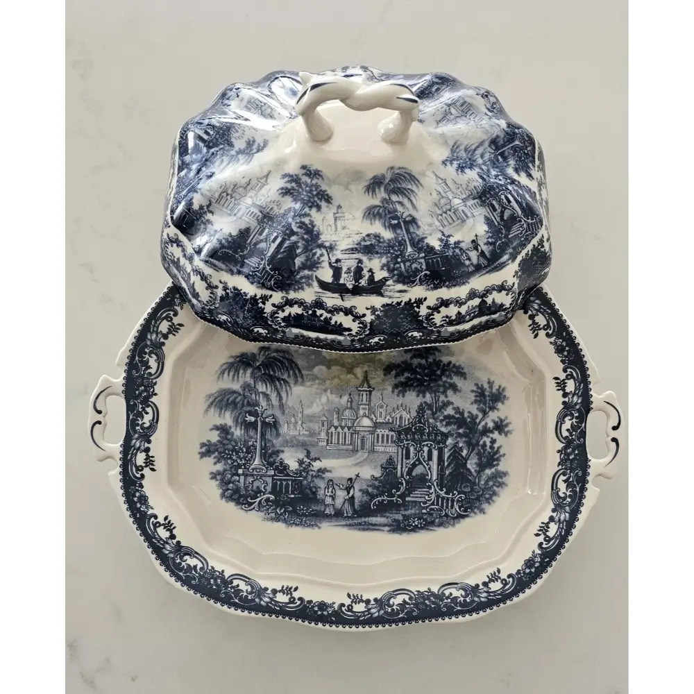 Close-up detail of the intricate British landscape and romantic ruins depicted in the Victoria Ironstone transferware.