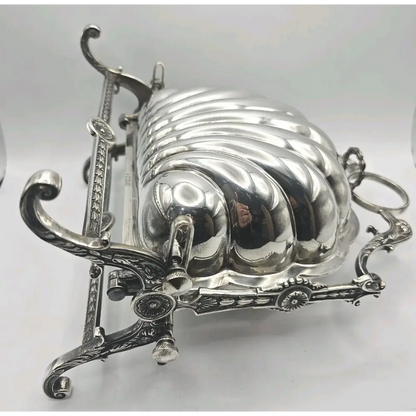 Silver decorative item with intricate design 