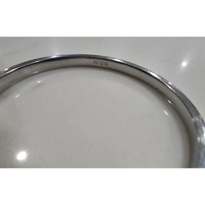 Silver bracelet on a white background
