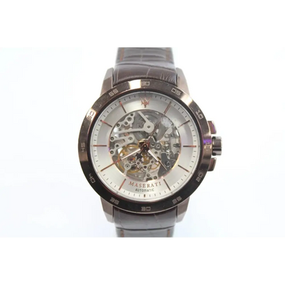 Maserati watch with a white face and metallic band