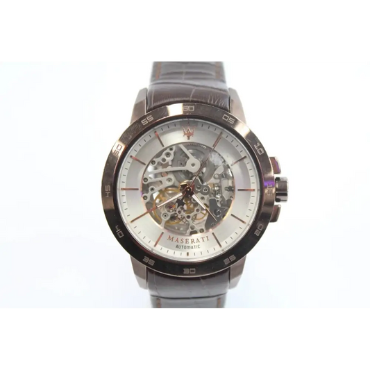 Maserati watch with a white face and metallic band