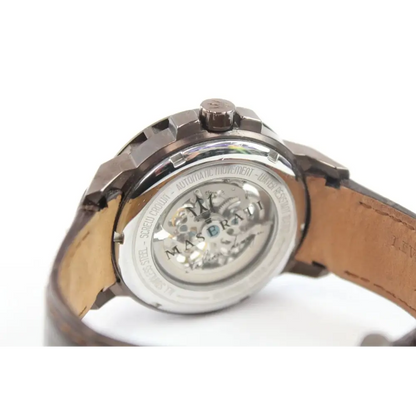 Close-up of a watch with a brown leather strap on a white background