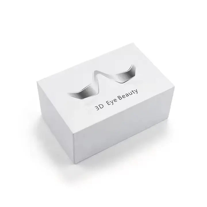 White packaging box with cutouts for 3D eye beauty products on a white background