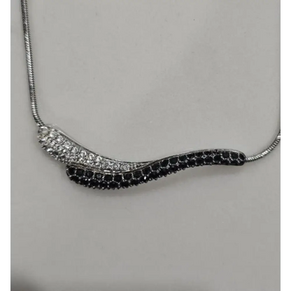 Necklace with black and white gemstone design