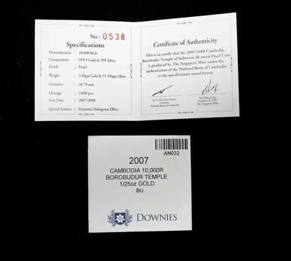 A 10.000 carat gold Cambodia Borobudur Temple pendant certificate and authenticity card from Downies, displayed on a solid black background.
