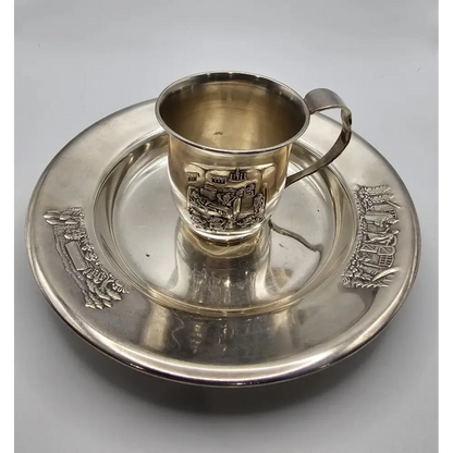 Silver cup and tray with engraved design 