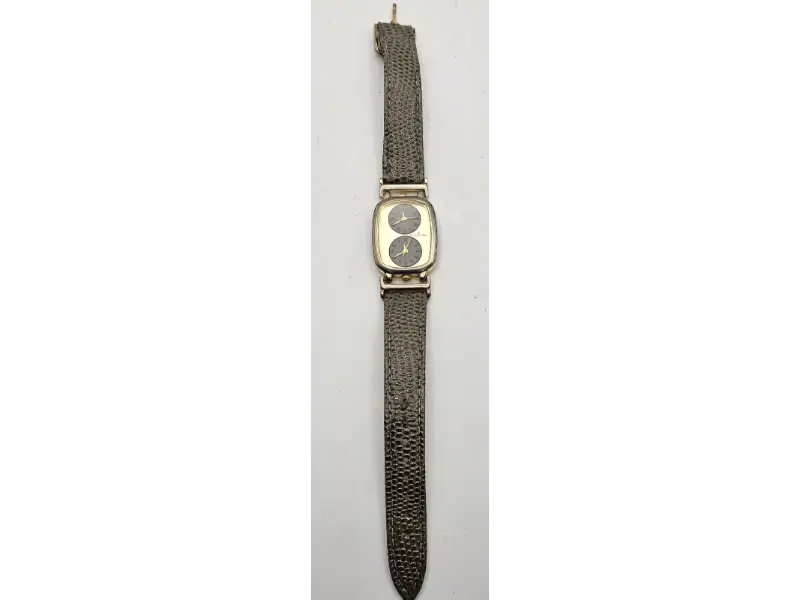 Swiss quartz Christian Dior vintage watch with gold dial and brown leather strap