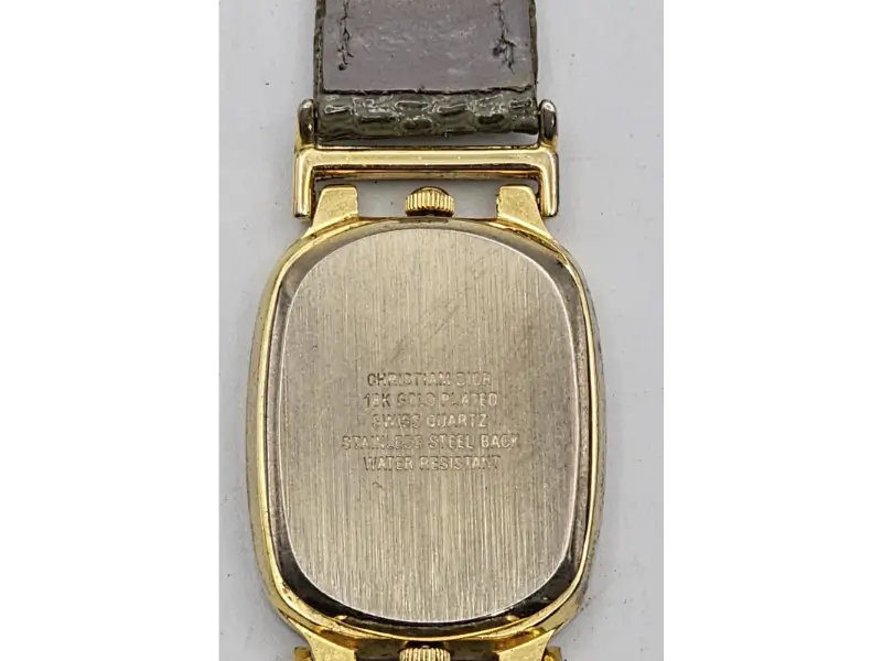 18K gold-plated Christian Dior watch showcasing classic Swiss craftsmanship