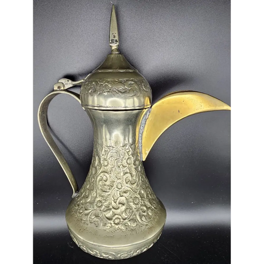 Decorative silver and gold pitcher