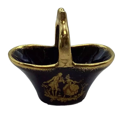 Decorative black basket with gold handle 