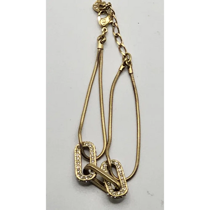 Gold necklace with a key pendant