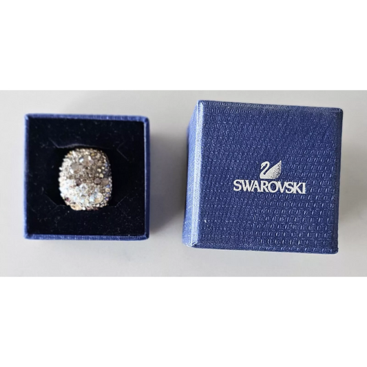 Swarovski ring in a blue box on a white background