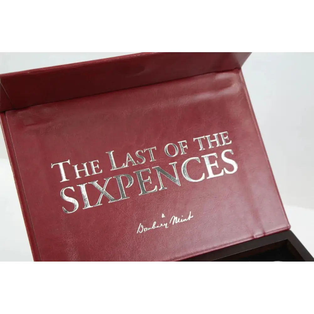 Red book titled 'The Last of the Sixpences' with silver text on a white background