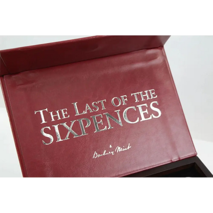 Red book titled 'The Last of the Sixpences' with silver text on a white background