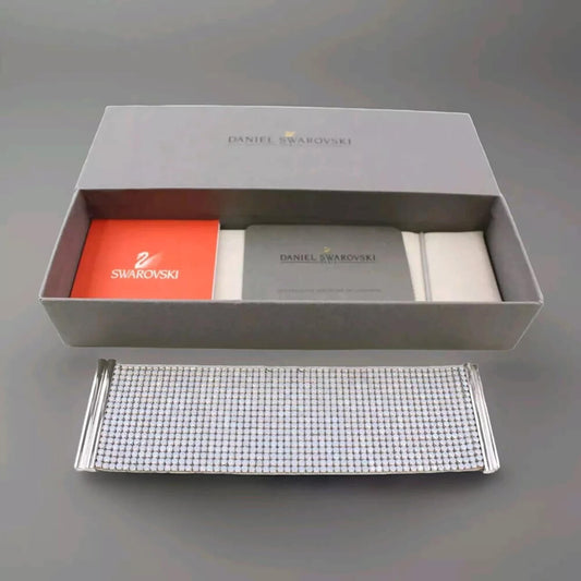 Swarovski product set with a silver tray, red box