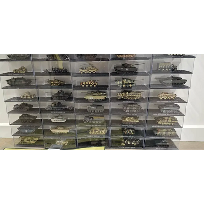 Collection of model tanks in a display case on a white background