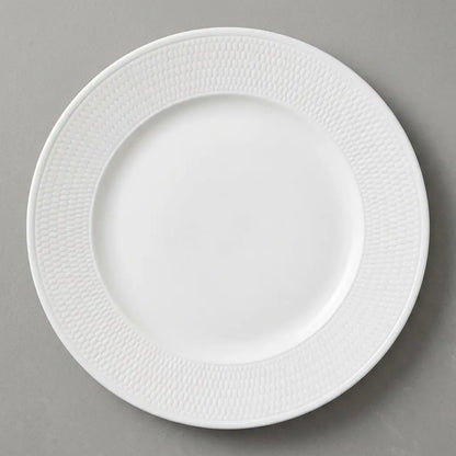 High-quality product photo of a 28.2 cm Wedgwood Gio dinner plate featuring a white fine bone china coupe design with a subtle intaglio textured rim.