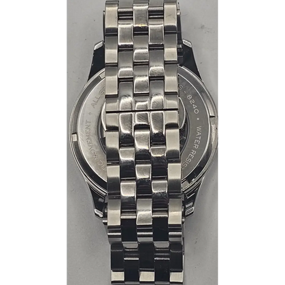 Silver watch with a detailed metal bracelet on a gray background
