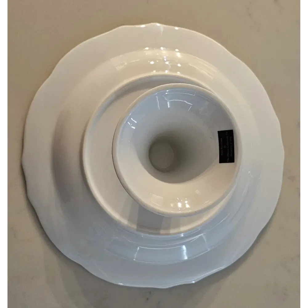 Juno Casa Elite Porcelain Serving Pedestal showing the Elegant Round Base and Gold Accents