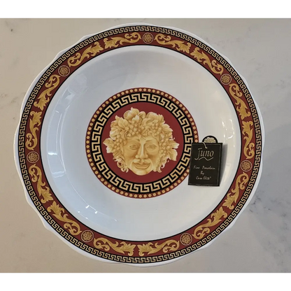 Decorative plate with gold and red design
