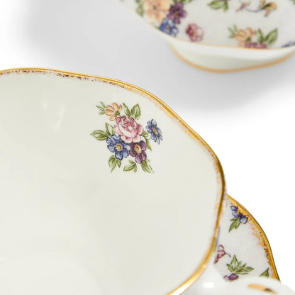 Close-up of a decorative ceramic cup with floral patterns 