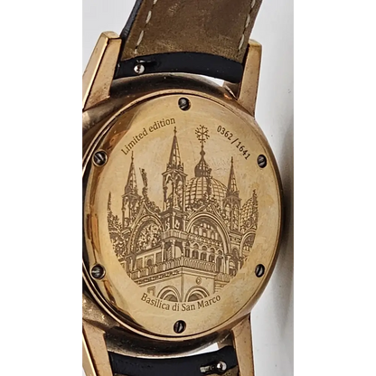Watch with engraved design on the back