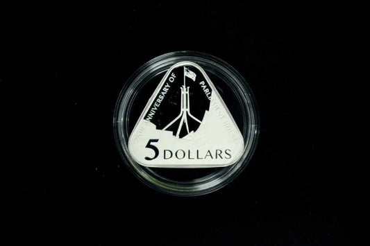 25th Anniversary of Parliament House $5 fine silver proof triangular coin front view
