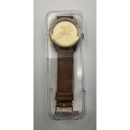 Watch with brown leather strap and gold face